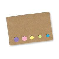 Kraft paper card with colorful round stickers on a white background