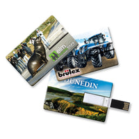 Three promotional USB flash drives with different designs on a white background. Custom Branded | Promotional USB | BRAND KNEW PROMOTIONAL PRODUCTS