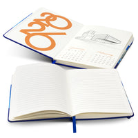 Open conference notebook with a page featuring the word 'Orange' in orange text on a white background
